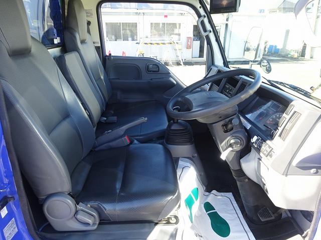 エルフトラック 　プレス式パッカー　４．６ｍ３　新明和工業製　３．３トン積載　連続積込　汚水タンク付　標準幅　１０尺　ルーフキャリア　６速ＭＴ　１５０馬力（8枚目）