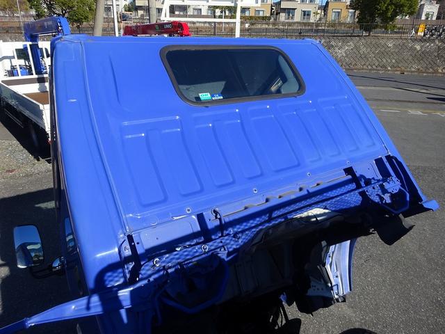 エルフトラック 　プレス式パッカー　４．６ｍ３　新明和工業製　３．３トン積載　連続積込　汚水タンク付　標準幅　１０尺　ルーフキャリア　６速ＭＴ　１５０馬力（42枚目）