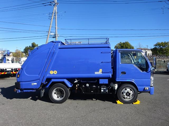 エルフトラック 　プレス式パッカー　４．６ｍ３　新明和工業製　３．３トン積載　連続積込　汚水タンク付　標準幅　１０尺　ルーフキャリア　６速ＭＴ　１５０馬力（68枚目）