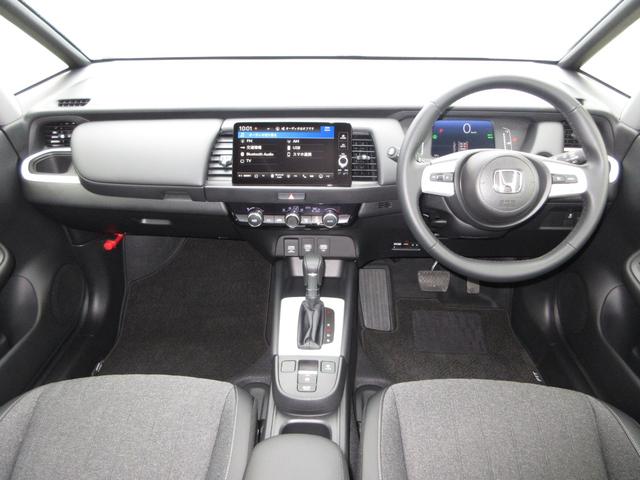 フィット ｅ：ＨＥＶホーム　ホンダセンシングホンダコネクトディスプレイＢｌｕｅｔｏｏｔｈドラレコＲカメラＥＴＣワンオーナー　コーナーソナー　１オーナー車　サイドカーテンエアバック　Ｂカメ　ＷＳＲＳ　スマートキープッシュスタート（16枚目）