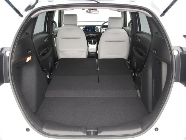フィット ｅ：ＨＥＶホーム　禁煙車ホンダセンシング純正９インチメモリーナビＢｌｕｅｔｏｏｔｈドラレコＥＴＣＲカメラワンオーナー　コーナーソナー　１オーナー車　サイドカーテンエアバック　Ｂカメ　ＷＳＲＳ　フルオートエアコン　ＬＥＤ（18枚目）