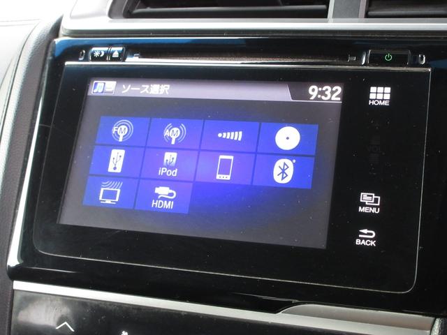 フィットハイブリッド Ｌパッケージ　純正メモリーナビＢｌｕｅｔｏｏｔｈＥＴＣＲカメラワンオーナー　ＥＴＣ付　地デジフルセグＴＶ　ＥＣＯＮ　エアバック　ＵＳＢ　盗難防止　オートクルーズコントロール　横滑り防止システム　バックカメラ付き（2枚目）