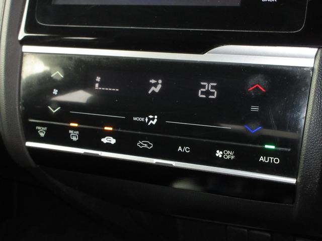 フィットハイブリッド Ｌパッケージ　純正メモリーナビＢｌｕｅｔｏｏｔｈＥＴＣＲカメラワンオーナー　ＥＴＣ付　地デジフルセグＴＶ　ＥＣＯＮ　エアバック　ＵＳＢ　盗難防止　オートクルーズコントロール　横滑り防止システム　バックカメラ付き（13枚目）