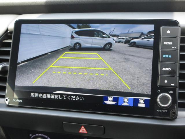 フィット ｅ：ＨＥＶホーム　／試乗車ＵＰ／禁煙車／ホンダセンシング／９インチナビ／ＢＴＡ／ＵＳＢ／フルセグ／音楽録音再生／ＤＶＤ／ＣＤ／Ｒカメラ／ＥＴＣ／Ｐセンサー／オートエアコン／ＬＥＤヘッドライト／スマートキー／　ＬＫＡ（5枚目）