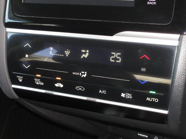 フィットハイブリッド Ｌパッケージ　純正メモリーナビ　Ｂｌｕｅｔｏｏｔｈ　ＥＴＣ　リアカメラ　ワンオーナー　ＥＴＣ　地デジフルセグＴＶ　運転席助手席エアバック　ＵＳＢ　盗難防止　クルーズコントロール　横滑り防止システム（15枚目）