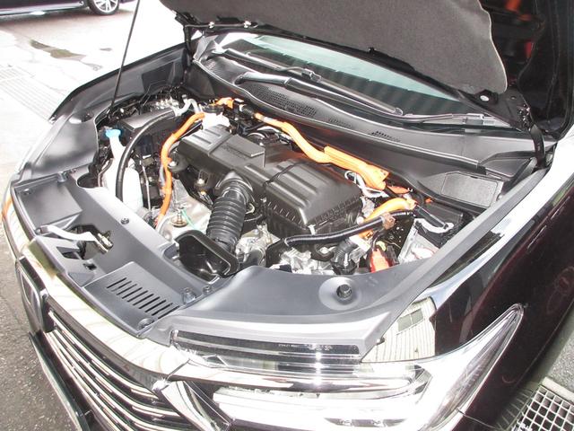 オデッセイハイブリッド ｅ：ＨＥＶアブソルート・ＥＸ　ホンダセンシング　純正１１．４インチコネクトナビＢｌｕｅｔｏｏｔｈドラレコＥＴＣＲカメラワンオーナー　前後ソナー　Ｂカメラ　両側自動ドア　サイドカメラ　フルセグＴＶ　オートライト　オットマン　革シート（5枚目）
