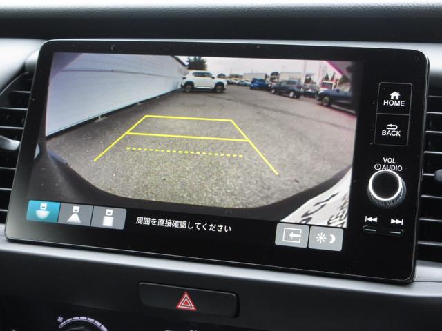 フィット ｅ：ＨＥＶホーム　当社元試乗車　ワンオーナー　禁煙車　純正９インチナビ　フルセグテレビ　Ｂｌｕｅｔｏｏｔｈ　ドラレコ　ＥＴＣ２．０　ＵＳＢ　ＬＥＤヘッドライト　オートライト　バックカメラ　サイド、カーテンエアバッグ（5枚目）