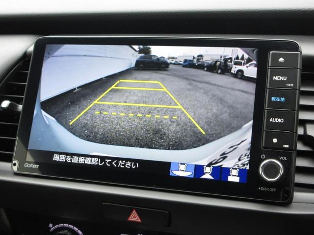 フィット ｅ：ＨＥＶホーム　元当社試乗車　禁煙車　純正９インチナビ　フルセグ　Ｂｌｕｅｔｏｏｔｈ　ミュージックサーバー　ＥＴＣ　バックカメラ　ＵＳＢ　障害物センサー　ＬＥＤヘッドライト　オートライト　サイド、カーテンエアバック（2枚目）