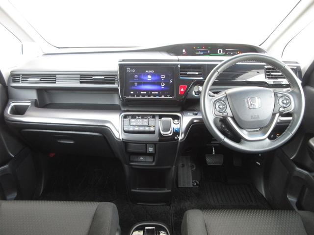 ステップワゴンスパーダ スパーダハイブリッドＧホンダセンシング　ワンオーナー　禁煙　１年保証　車検整備付　７人乗り　９インチメモリーナビ　ＢＴオーディオ接続　ミュージックサーバー　リアカメラ　ＥＴＣ　後席モニター　ヒーター付ドアミラー　両側パワースライドドア（16枚目）