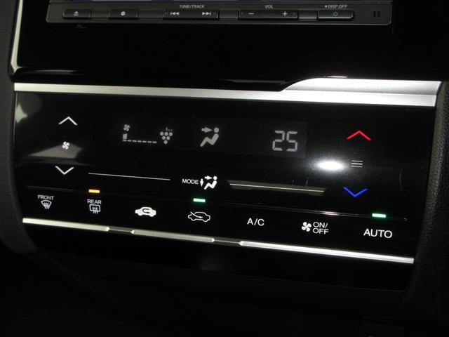 フィットハイブリッド Ｆパッケージ　純正メモリーナビＢｌｕｅｔｏｏｔｈＥＴＣＲカメラワンオーナー　盗難警報装置　ワンオ－ナ－車　記録簿有り　ＡＵＴＯエアコン　カーテンエアバック　助手席エアバック　ＥＣＯＮ　ＥＴＣ付き　リヤカメラ　禁煙（19枚目）
