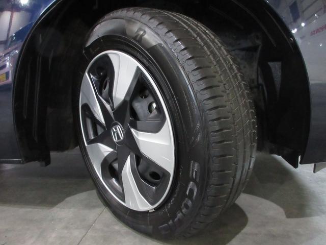 フィットハイブリッド Ｆパッケージ　純正メモリーナビＢｌｕｅｔｏｏｔｈＥＴＣＲカメラワンオーナー　盗難警報装置　ワンオ－ナ－車　記録簿有り　ＡＵＴＯエアコン　カーテンエアバック　助手席エアバック　ＥＣＯＮ　ＥＴＣ付き　リヤカメラ　禁煙（29枚目）