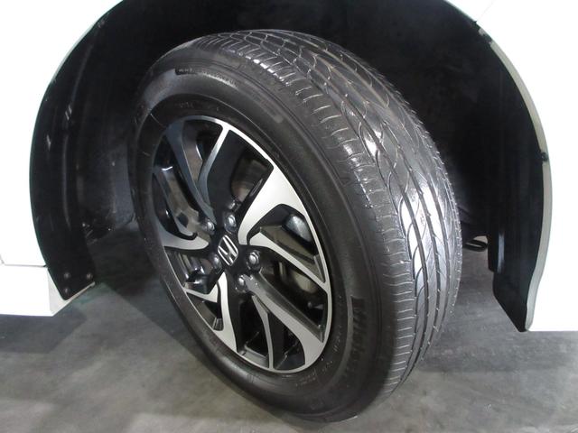 ステップワゴンスパーダ スパーダホンダセンシング　純正メモリーナビＢｌｕｅｔｏｏｔｈドラレコＥＴＣＲカメラワンオーナー　盗難防止　助手席エアバッグ　ワンオーナ－　Ｗパワスラ　記録簿有　リアオートエアコン　地デジ　ＬＥＤライト　横滑り防止システム　禁煙（27枚目）