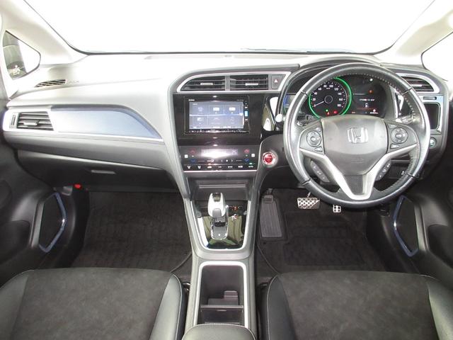 シャトル ハイブリッドＸホンダセンシング　純正メモリーナビＢｌｕｅｔｏｏｔｈＥＴＣＲカメラ　横滑抑制　リヤカメラ　スマ－トキ－　イモビ　ＴＶナビ　サイドエアバッグ　シートヒーター付き　キーレス　ＵＳＢ　ＤＶＤ再生機能　ＥＣＯＮ　クルコン（9枚目）