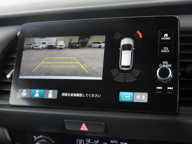フィット ｅ：ＨＥＶホーム　ホンダセンシングホンダコネクトディスプレイＢｌｕｅｔｏｏｔｈドラレコＲカメラＥＴＣワンオーナー　前後誤発進抑制機能　クリソナ　助手席エアバッグ　運転席エアバッグ　１オナ　アイドリングストップ　禁煙（7枚目）