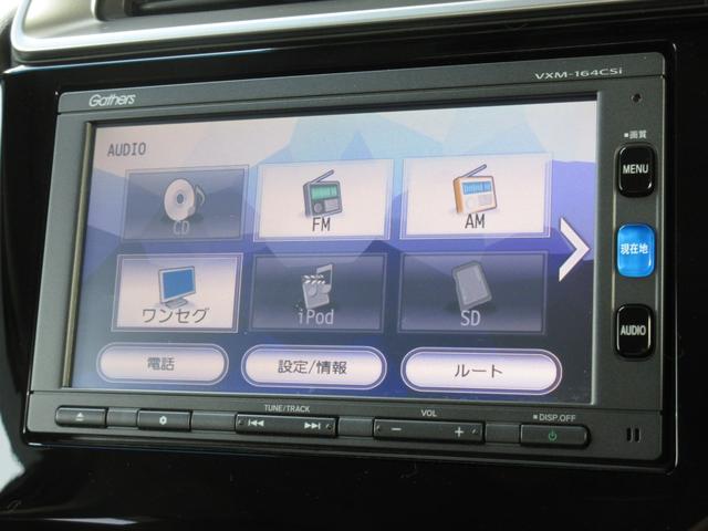 フィット １３Ｇ・Ｆパッケージ　純正メモリーナビＢｌｕｅｔｏｏｔｈドラレコＥＴＣＲカメラ　イモビ　ＬＥＤライト　スマ－トキ－　記録簿有り　ＶＳＡ　ＥＴＣ付き　助手席エアバッグ　オートエアコン　エアバック　ＰＳ　キ－フリ－　Ｄレコ（2枚目）
