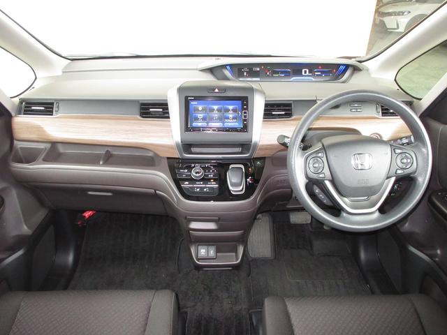 フリードハイブリッド ハイブリッド・Gホンダセンシング 純正メモリーナビBluetoothドラレコETCRカメラワンオーナー 軽減ブレーキ キーフリーシステム 1オ-ナ- 記録簿 DVD再生可能 ECON 後カメラ Aクルーズ 地デジフルセグTV シートH(16枚目)