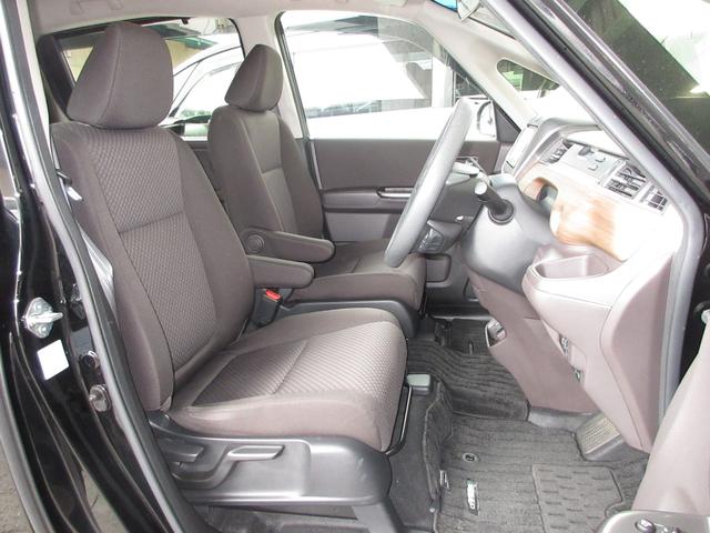 フリードハイブリッド ハイブリッド・Gホンダセンシング 純正メモリーナビBluetoothドラレコETCRカメラワンオーナー 軽減ブレーキ キーフリーシステム 1オ-ナ- 記録簿 DVD再生可能 ECON 後カメラ Aクルーズ 地デジフルセグTV シートH(26枚目)