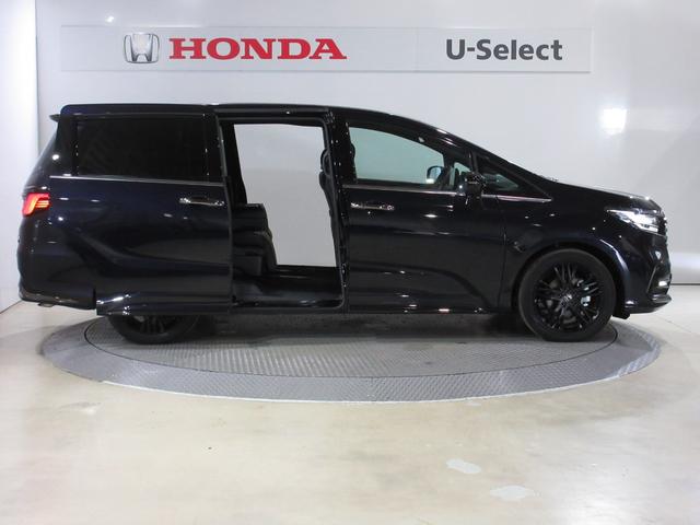 オデッセイハイブリッド ｅ：ＨＥＶアブソルート・ＥＸブラックエディション　当社元試乗車　禁煙車　純正１１．４インチナビ　フルセグ　Ｂｌｕｅｔｏｏｔｈ　ミュージックサーバー　ドラレコ　全周囲カメラ　本革シート　電動シート　シートヒーター　両側電動スライドドア　サイドエアバック（10枚目）