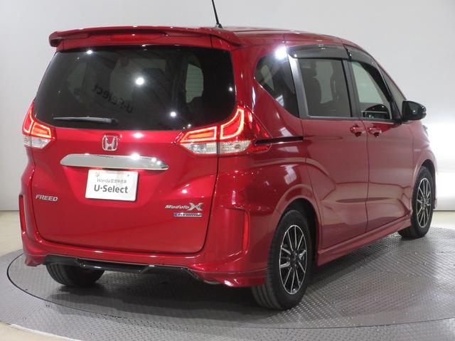 フリードハイブリッド ハイブリッド・モデューロXホンダセンシング 純正9インチメモリーナビBluetoothETCRカメラワンオーナー オートクルーズコントロール LEDライト フルオートエアコン 追突軽減B ETC車載器 リヤカメラ 3列 DVD再生可 フルセグ(9枚目)