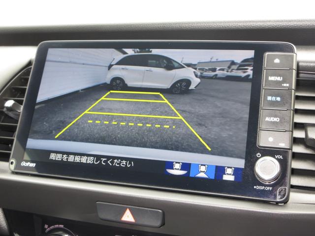 フィット ホーム 禁煙車ホンダセンシング純正9インチメモリーナビBluetoothETCRカメラワンオーナー 衝突軽減 リアカメラ ソナー USB接続 AAC 横滑り防止機能 サイドエアバック ワンオーナー車 スマキー(4枚目)