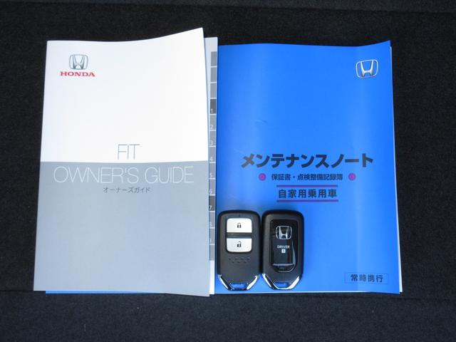 フィット ホーム 禁煙車ホンダセンシング純正9インチメモリーナビBluetoothETCRカメラワンオーナー 衝突軽減 リアカメラ ソナー USB接続 AAC 横滑り防止機能 サイドエアバック ワンオーナー車 スマキー(17枚目)