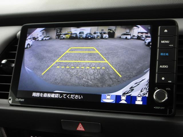 フィット ｅ：ＨＥＶＲＳ　禁煙車ホンダセンシング純正９インチメモリーナビＢｌｕｅｔｏｏｔｈドラレコＥＴＣＲカメラワンオーナー　エアバッグ　ナビ＆ＴＶ　パワーウィンドウ　助手席エアバッグ　Ｄレコ　フルセグテレビ　ＥＴＣ装備（11枚目）