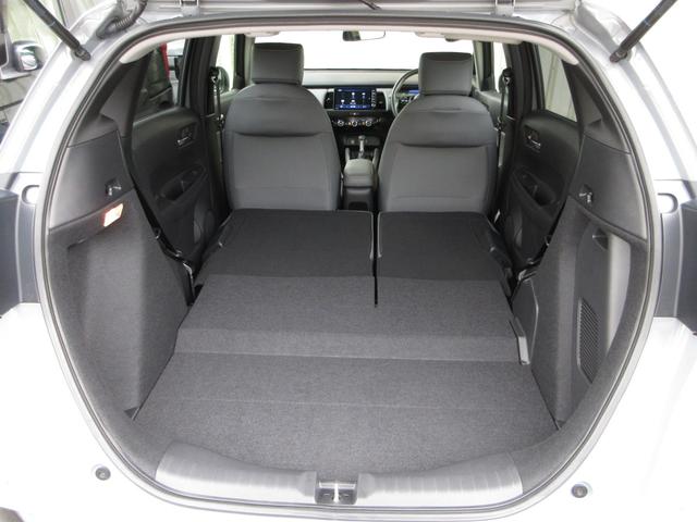 フィット ｅ：ＨＥＶＲＳ　禁煙車ホンダセンシング純正９インチメモリーナビＢｌｕｅｔｏｏｔｈドラレコＥＴＣＲカメラワンオーナー　エアバッグ　ナビ＆ＴＶ　パワーウィンドウ　助手席エアバッグ　Ｄレコ　フルセグテレビ　ＥＴＣ装備（20枚目）