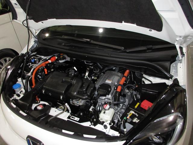 フィット e:HEVホーム 禁煙 当社元試乗車 純正9インチプレミアムインターナビ Bluetooth ドラレコ Rカメラ ETC 本革巻ステアリングホイール 本革巻セレクトレバー USBチャージャー 電子制御パーキングブレーキ(6枚目)