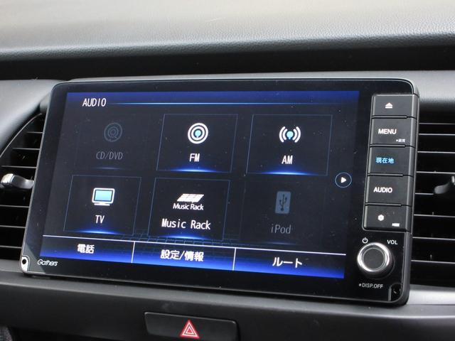 フィット e:HEVホーム 禁煙 当社元試乗車 純正9インチプレミアムインターナビ Bluetooth ドラレコ Rカメラ ETC 本革巻ステアリングホイール 本革巻セレクトレバー USBチャージャー 電子制御パーキングブレーキ(11枚目)
