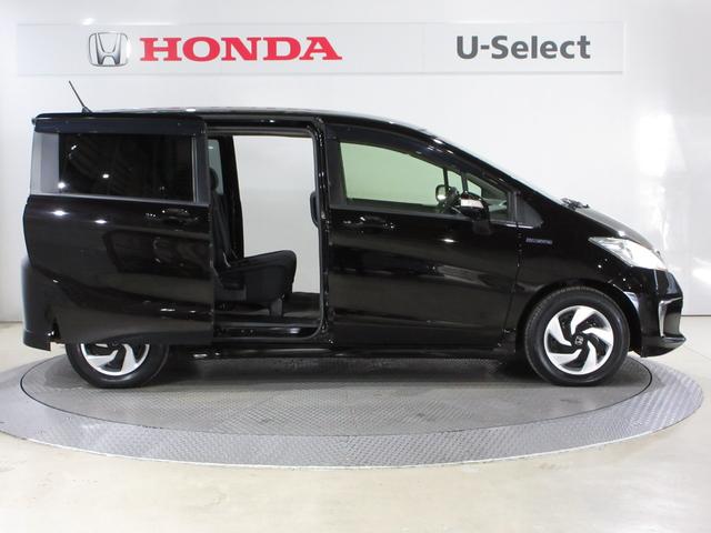 フリードハイブリッド ジャストセレクション 純正メモリーナビBluetoothETCRカメラワンオーナー ナビテレビ セキュリティー 横滑り防止機能 記録簿 オートクルーズ エアバック DVD再生可能 キーレスエントリー ワンセグTV PS(9枚目)