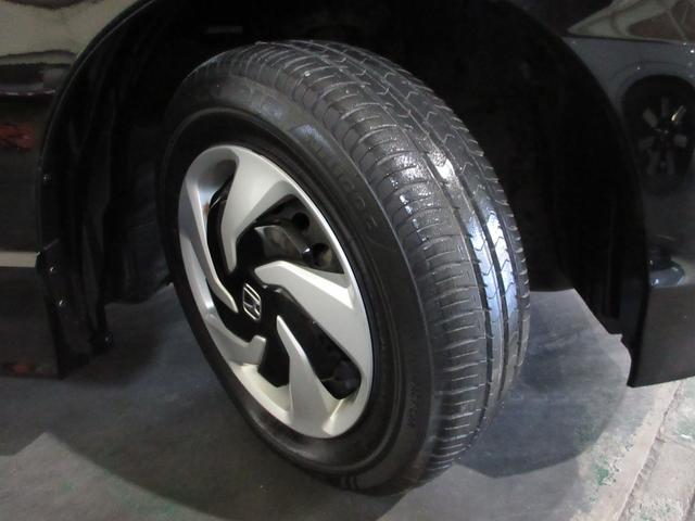 フリードハイブリッド ジャストセレクション 純正メモリーナビBluetoothETCRカメラワンオーナー ナビテレビ セキュリティー 横滑り防止機能 記録簿 オートクルーズ エアバック DVD再生可能 キーレスエントリー ワンセグTV PS(24枚目)