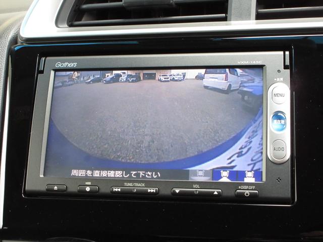 フィット 13G・Fパッケージ 純正メモリーナビETCRカメラワンオーナー イモビ ワンオーナー車 スマ-トキ- サイドエアバッグ 記録簿有り VSA ETC付き 助手席エアバッグ オートエアコン エアバック PS キ-フリ- PW(7枚目)