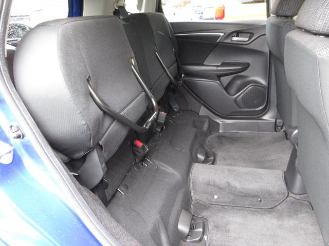 フィット 13G・Fパッケージ 純正メモリーナビETCRカメラワンオーナー イモビ ワンオーナー車 スマ-トキ- サイドエアバッグ 記録簿有り VSA ETC付き 助手席エアバッグ オートエアコン エアバック PS キ-フリ- PW(20枚目)