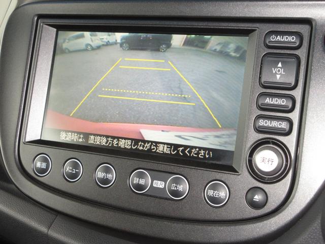 フィットハイブリッド ＲＳ　ワンオーナー　禁煙車　６速マニュアルミッション　ホンダインターナビ　ディスチャージヘッドライト　オートライト　ＥＴＣ　１６インチアルミホイール　コンフォートビューパッケージ　ＨＯＮＤＡスマートキー（14枚目）