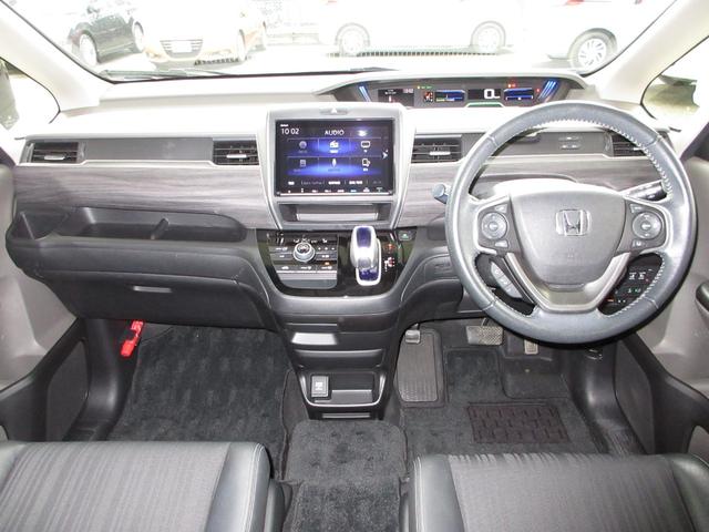 フリードハイブリッド ハイブリッド・Gホンダセンシング ・雹害 ・2列目ベンチシート(7人乗り) ・車検…令和9年3月 ・純正9インチナビ ・リアカメラ ・ETC ・両側電動スライドドア ・ホンダセンシング ・Bluetooth AUDIO ・1年保証付(3枚目)