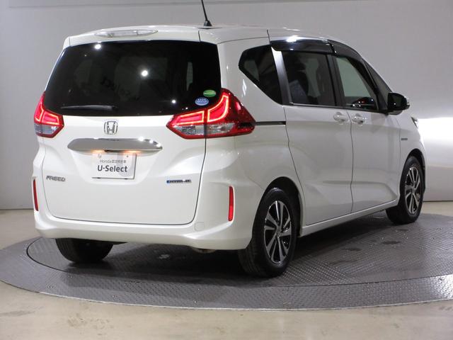 フリードハイブリッド ハイブリッド・Gホンダセンシング ・雹害 ・2列目ベンチシート(7人乗り) ・車検…令和9年3月 ・純正9インチナビ ・リアカメラ ・ETC ・両側電動スライドドア ・ホンダセンシング ・Bluetooth AUDIO ・1年保証付(9枚目)
