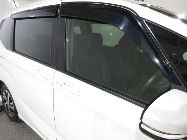 フリードハイブリッド ハイブリッド・Gホンダセンシング ・雹害 ・2列目ベンチシート(7人乗り) ・車検…令和9年3月 ・純正9インチナビ ・リアカメラ ・ETC ・両側電動スライドドア ・ホンダセンシング ・Bluetooth AUDIO ・1年保証付(11枚目)