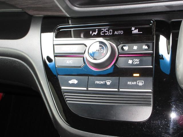 フリードハイブリッド ハイブリッド・Gホンダセンシング 純正メモリーナビBluetoothドラレコETCRカメラ 軽減ブレーキ キーフリーシステム 記録簿 DVD再生可能 ECON 後カメラ Aクルーズ 地デジフルセグTV LEDヘッドランプ 横滑防止(14枚目)