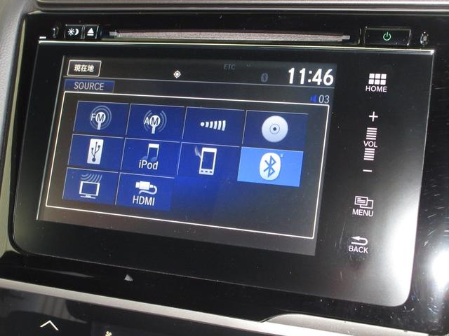 フィットハイブリッド Ｓホンダセンシング　純正メモリーナビＢｌｕｅｔｏｏｔｈＥＴＣＲカメラ　スマ－トキ－　ナビＴＶ　禁煙　アクティブクルーズコントロール　パワーウインドウ　サイドエアバック　ＤＶＤ再生　パワーステアリング　整備記録簿　ＡＢＳ（6枚目）