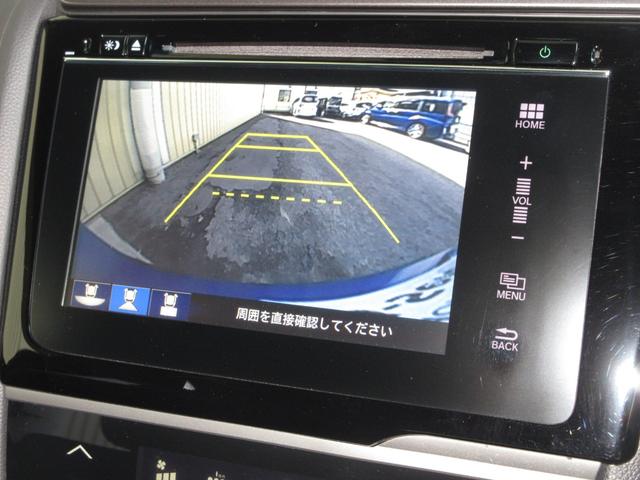 フィットハイブリッド Ｓホンダセンシング　純正メモリーナビＢｌｕｅｔｏｏｔｈＥＴＣＲカメラ　スマ－トキ－　ナビＴＶ　禁煙　アクティブクルーズコントロール　パワーウインドウ　サイドエアバック　ＤＶＤ再生　パワーステアリング　整備記録簿　ＡＢＳ（7枚目）