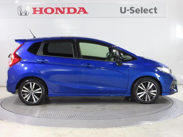 フィットハイブリッド Ｓホンダセンシング　純正メモリーナビＢｌｕｅｔｏｏｔｈＥＴＣＲカメラ　スマ－トキ－　ナビＴＶ　禁煙　アクティブクルーズコントロール　パワーウインドウ　サイドエアバック　ＤＶＤ再生　パワーステアリング　整備記録簿　ＡＢＳ（11枚目）