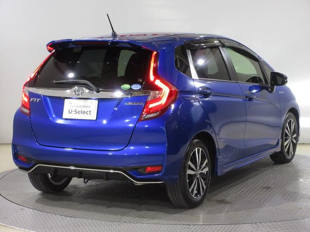 フィットハイブリッド Ｓホンダセンシング　純正メモリーナビＢｌｕｅｔｏｏｔｈＥＴＣＲカメラ　スマ－トキ－　ナビＴＶ　禁煙　アクティブクルーズコントロール　パワーウインドウ　サイドエアバック　ＤＶＤ再生　パワーステアリング　整備記録簿　ＡＢＳ（12枚目）