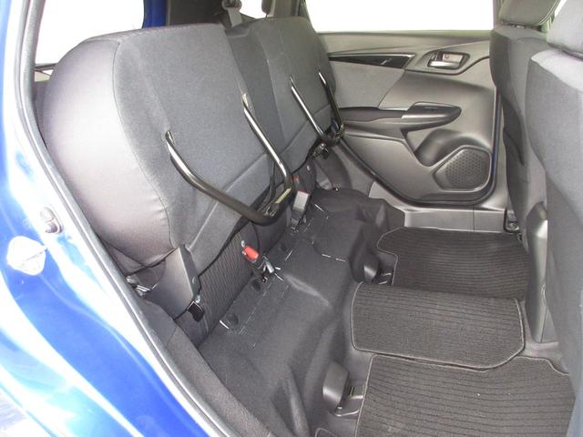 フィットハイブリッド Ｓホンダセンシング　純正メモリーナビＢｌｕｅｔｏｏｔｈＥＴＣＲカメラ　スマ－トキ－　ナビＴＶ　禁煙　アクティブクルーズコントロール　パワーウインドウ　サイドエアバック　ＤＶＤ再生　パワーステアリング　整備記録簿　ＡＢＳ（25枚目）