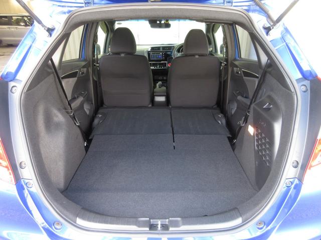 フィットハイブリッド Ｓホンダセンシング　純正メモリーナビＢｌｕｅｔｏｏｔｈＥＴＣＲカメラ　スマ－トキ－　ナビＴＶ　禁煙　アクティブクルーズコントロール　パワーウインドウ　サイドエアバック　ＤＶＤ再生　パワーステアリング　整備記録簿　ＡＢＳ（27枚目）