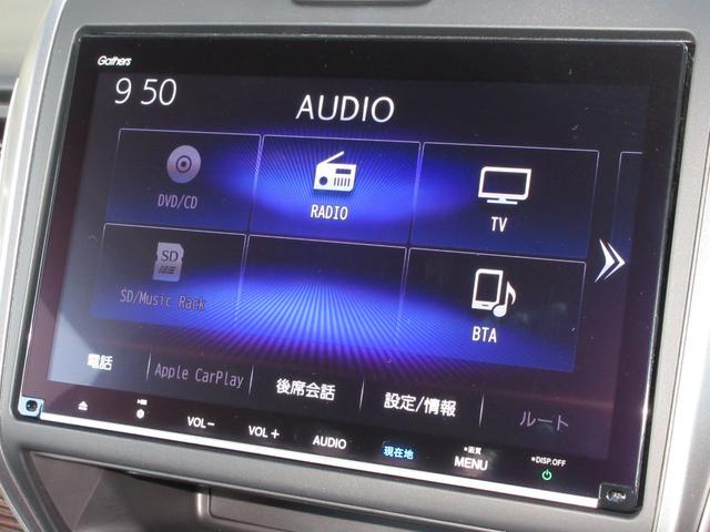 フリードハイブリッド ハイブリッド・クロスター　ワンオーナー　禁煙　２年保証　車検整備付　６人乗り　９インチメモリーナビ　フルセグＴＶ　ミュージックサーバー　ＢＴオーディオ接続　リアカメラ　ＥＴＣ　シートヒーター　ヒーター付ドアミラー　スマートキー（3枚目）