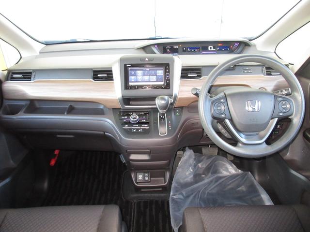 フリード Ｇ・ホンダセンシング　・２列目キャプテンシート（６人乗シート）・ワンオーナー　・禁煙　・令和２年１０月登録　・２万１千キロ　・車検２年付　・ルナシルバーメタリック　・純正ナビ　・リアカメラ　・ＥＴＣ　・両側電動スライドドア（2枚目）