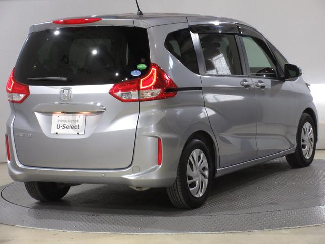 フリード Ｇ・ホンダセンシング　・２列目キャプテンシート（６人乗シート）・ワンオーナー　・禁煙　・令和２年１０月登録　・２万１千キロ　・車検２年付　・ルナシルバーメタリック　・純正ナビ　・リアカメラ　・ＥＴＣ　・両側電動スライドドア（9枚目）