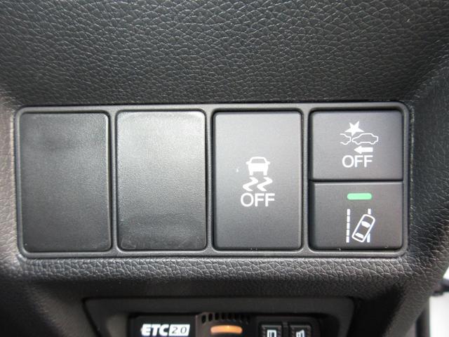 ステップワゴンスパーダ スパーダホンダセンシング 純正9インチメモリーナビBluetoothETCRカメラワンオーナー 盗難防止 助手席エアバッグ ワンオーナ- Wパワスラ 記録簿有 リアオートエアコン 地デジ LEDライト 横滑り防止システム(12枚目)