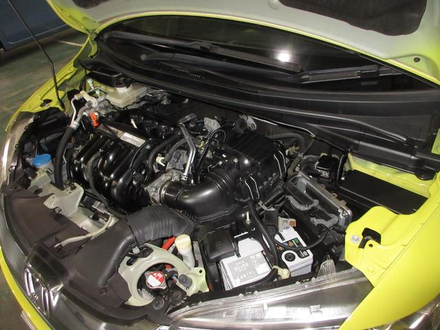 フィットハイブリッド Ｌパッケージ　Ｕ－Ｓｅｌｅｃｔ稲城オープン　純正メモリーナビＥＴＣＲカメラ　禁煙　ナビ＆ＴＶ　地デジフルセグＴＶ　サイドエアバック　ＤＶＤ再生　ＬＥＤ　ＥＣＯＮ　バックカメラ　クルーズコントロール　ＡＵＴＯエアコン（3枚目）