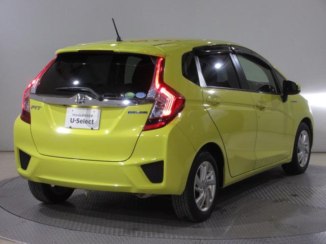 フィットハイブリッド Ｌパッケージ　Ｕ－Ｓｅｌｅｃｔ稲城オープン　純正メモリーナビＥＴＣＲカメラ　禁煙　ナビ＆ＴＶ　地デジフルセグＴＶ　サイドエアバック　ＤＶＤ再生　ＬＥＤ　ＥＣＯＮ　バックカメラ　クルーズコントロール　ＡＵＴＯエアコン（7枚目）